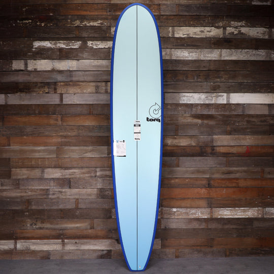 Torq Longboard TET 9'6 × 23 ½ × 3 ¼ Surfboard - Light Blue Fade
