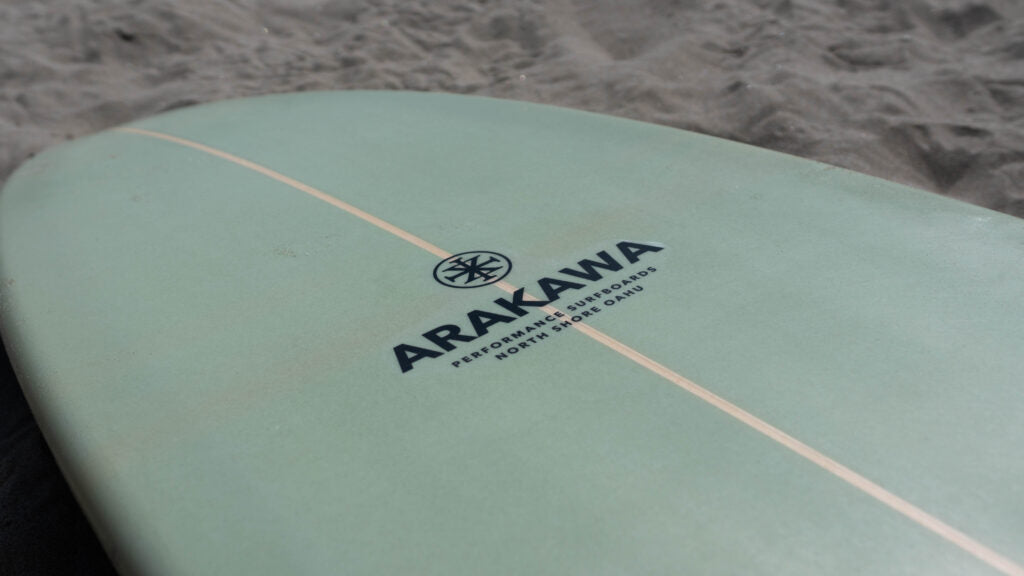 Arakawa logo on the Holy Moli surfboard.
